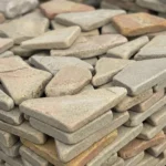 Камень серый галтованный